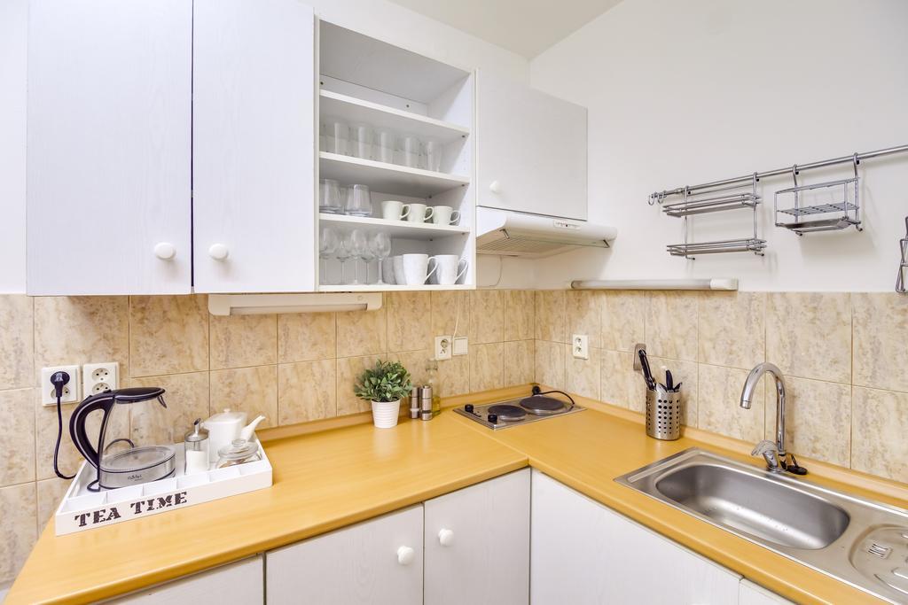 White & Woody Quadrio Apartments Apartment
