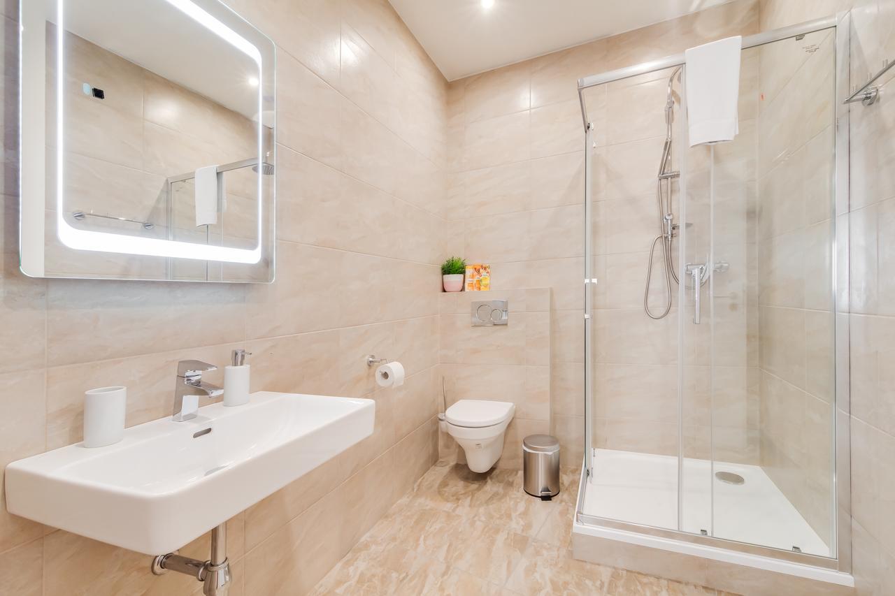 White & Woody Quadrio Apartments *